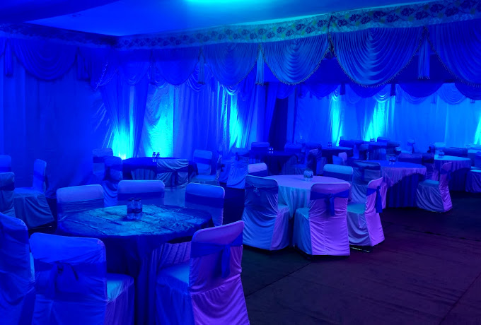 Hotel Holiday Hill Rishikesh [Well-arranged Banquet Seating Area With Round Tables And Banquet Chairs]