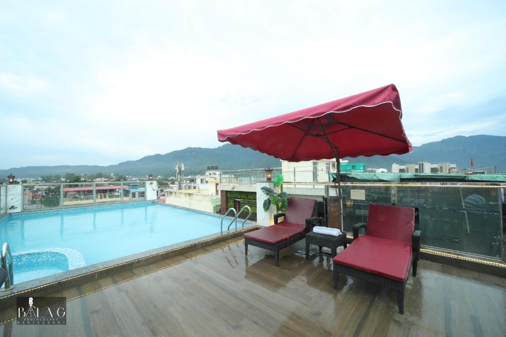 Hotel Holy Vivasa Rishikesh [Well-maintained Swimming Pool At Ariya Hotel With Lounge Area]