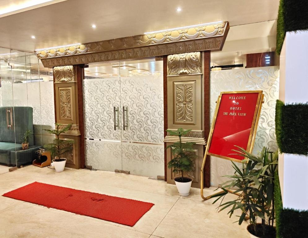 Hotel The Park View Prayagraj [Main Entrance Of Hotel The Park View With Welcoming Signage And Stylish Design.]
