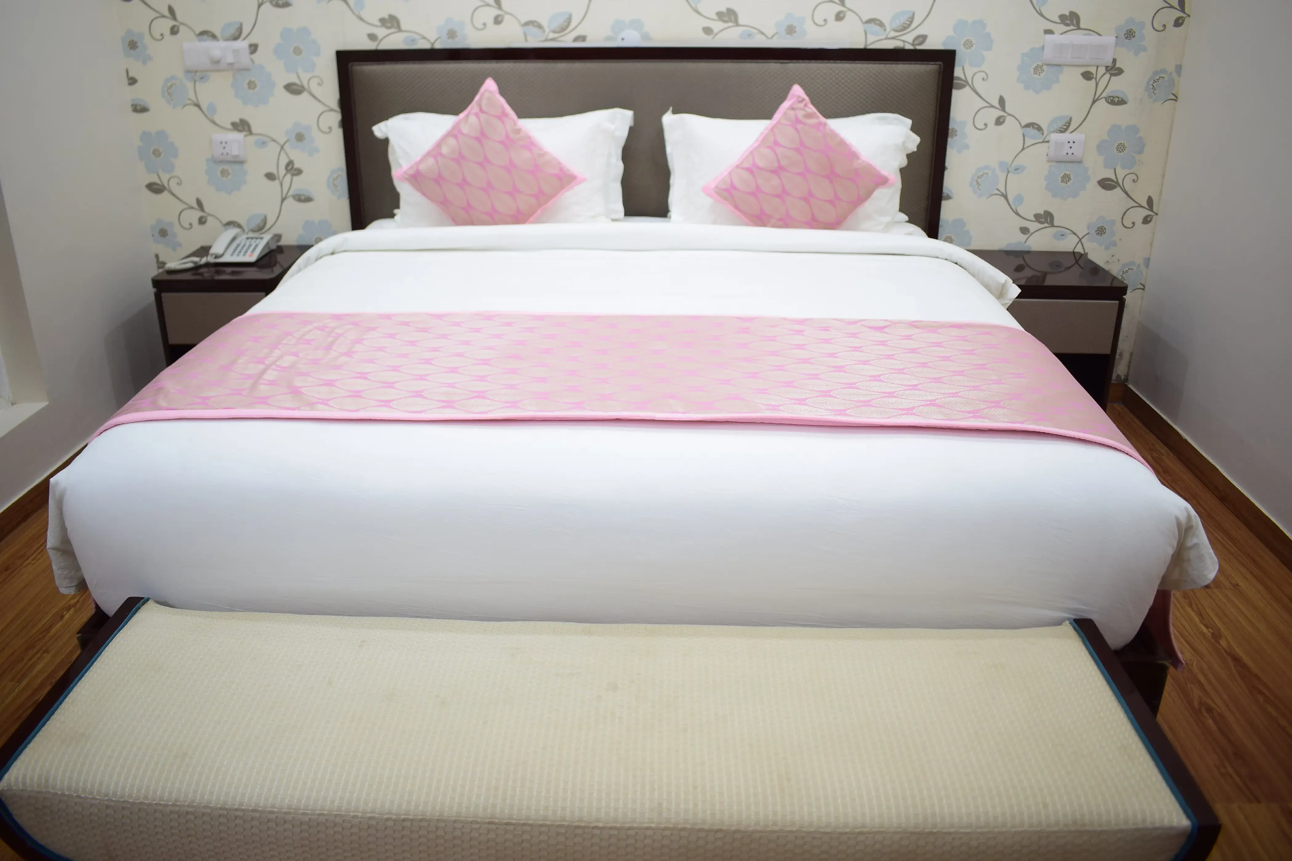 Hotel Naveen Continental Prayagraj [Deluxe Room At Hotel Naveen Continental With A Neatly Arranged King-size Bed And Modern Design.]