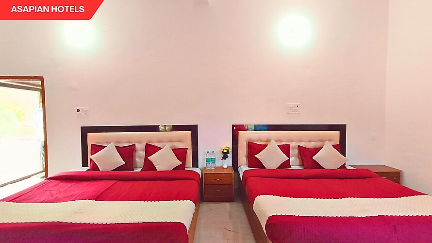 Maa Mandakini Resort Chitrakoot [Full View Of The Comfortable Double Bed In The Family Room]