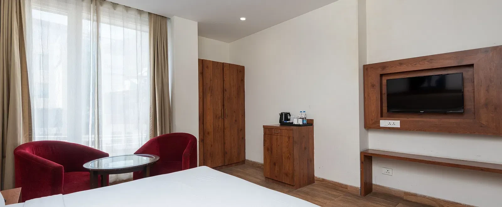 The Classio By DLS Hotels Rishikesh [Wall-mounted Smart LED TV With Streaming Options In Premium Room]