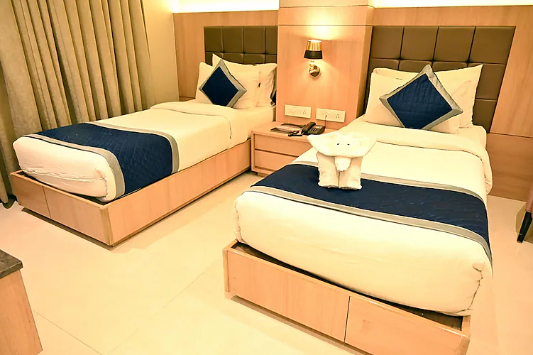 The Elegance Hotel Varanasi Varanasi [Ell-furnished Hotel Bedroom With A Cozy Bed, Soft Lighting, And Modern Decor]